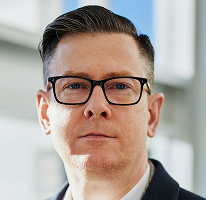 Portrét vedoucího pracovníka Alexander Hughes, generálního ředitele firmy zaměřené na obchodování s kryptoměnami